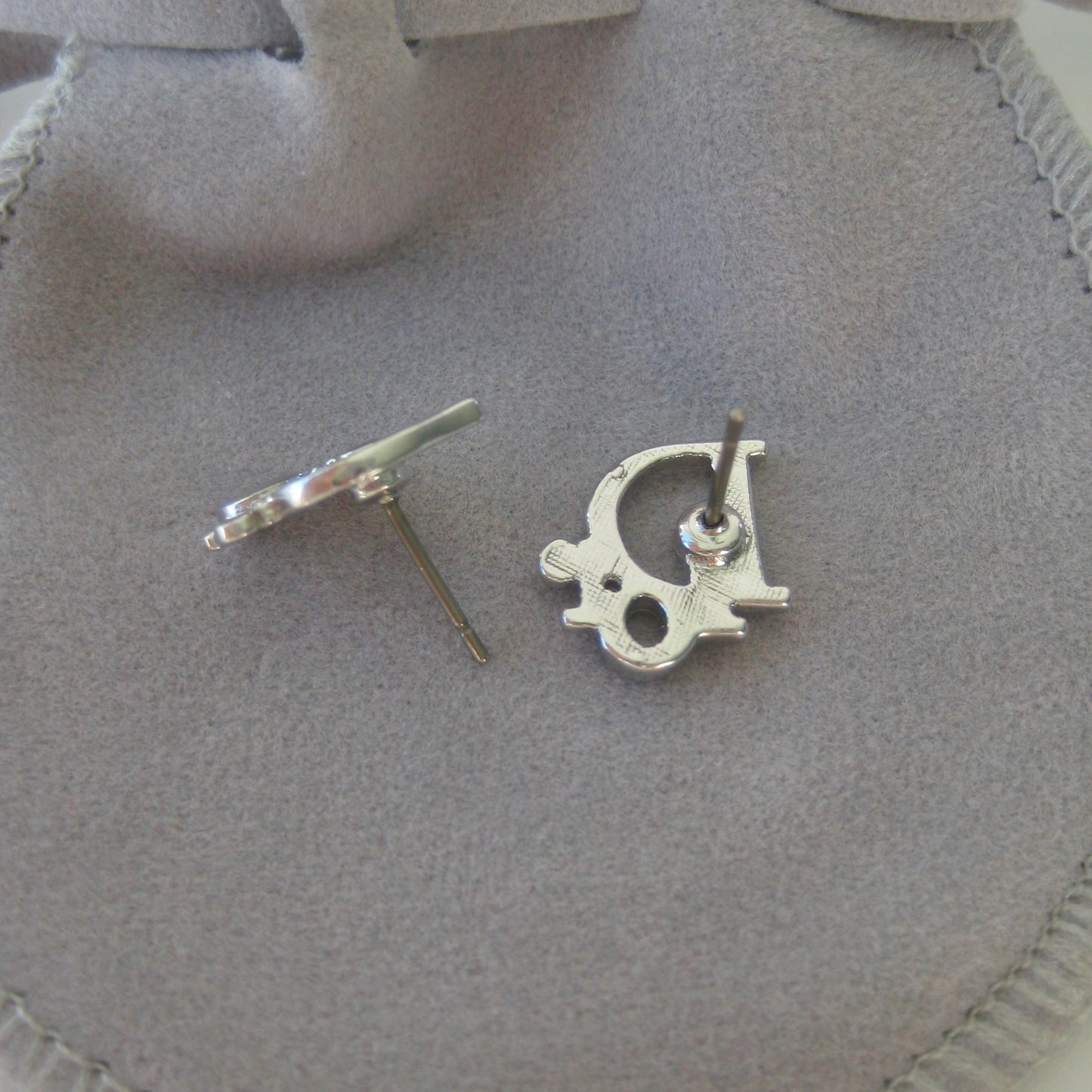 Dior silver logo earrings