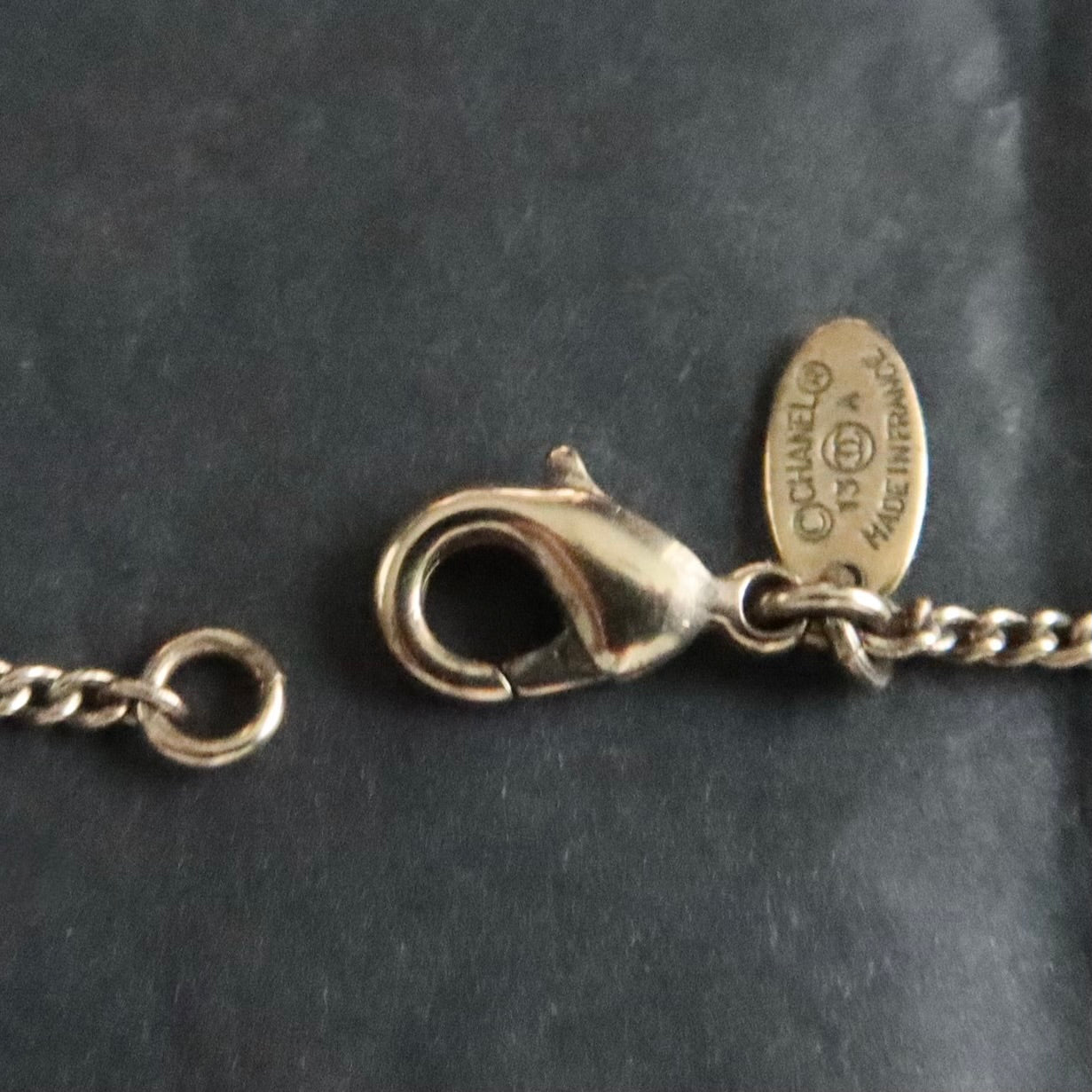 Chanel Enamel CC Camellia necklace in ivory and gold-tone metal