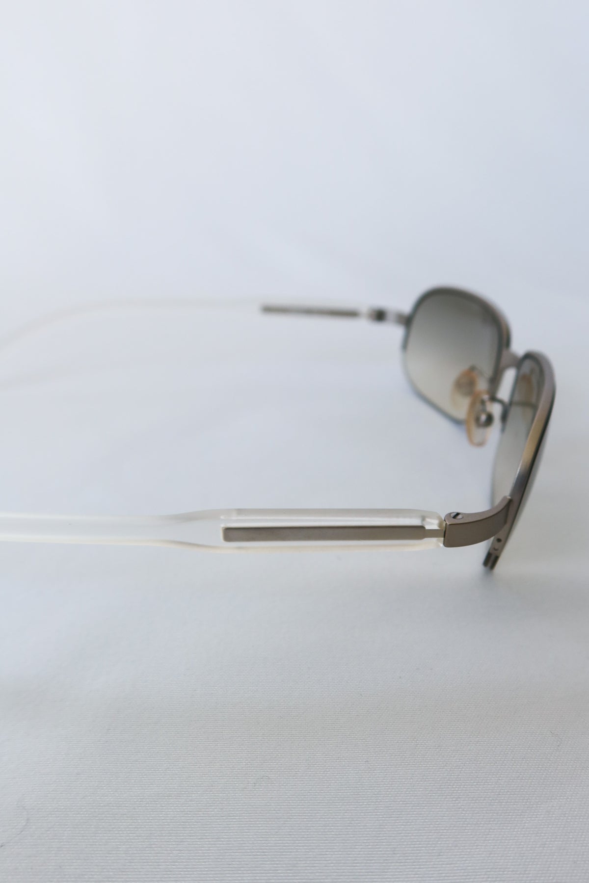 Prada Silver Rectangle Sunglasses · Case