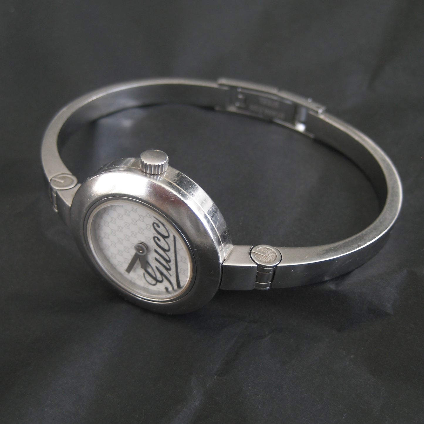 Gucci 105 stainless steel bangle watch
