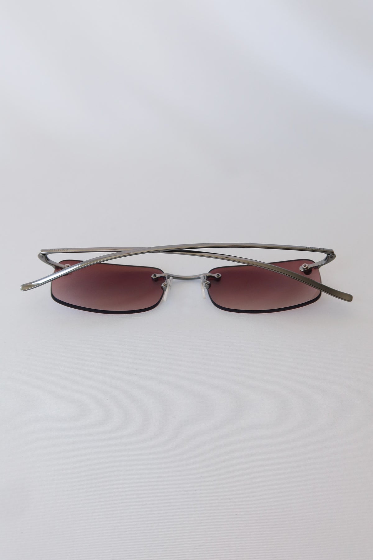 Gucci Rimless Rectangle Sunglasses · Case