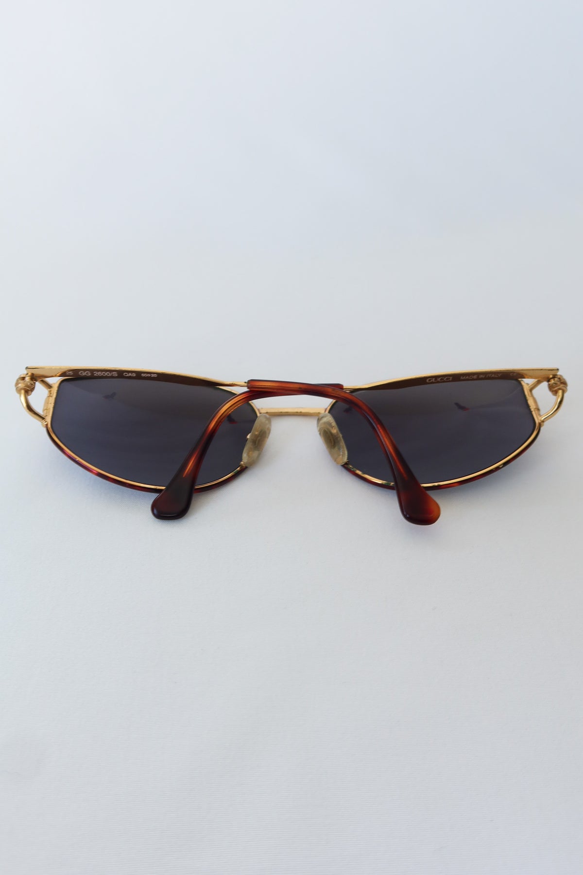 Gucci Gold Oval Knot Sunglasses