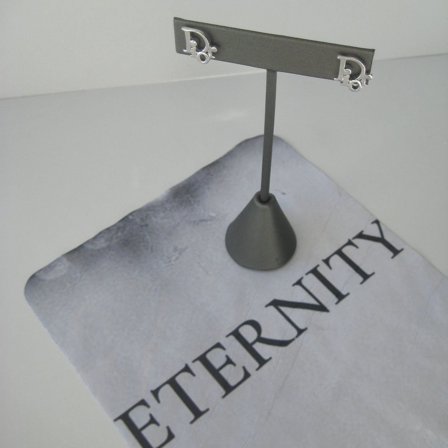 Dior silver logo earrings