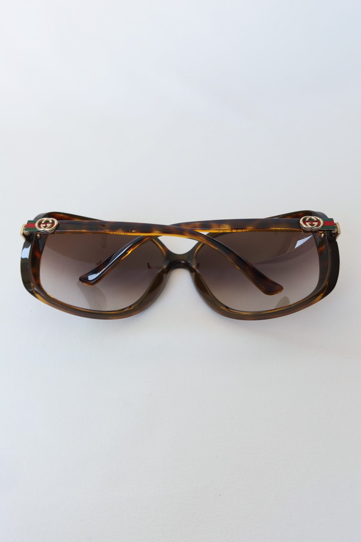 Gucci Tortoise Web Sunglasses · Case
