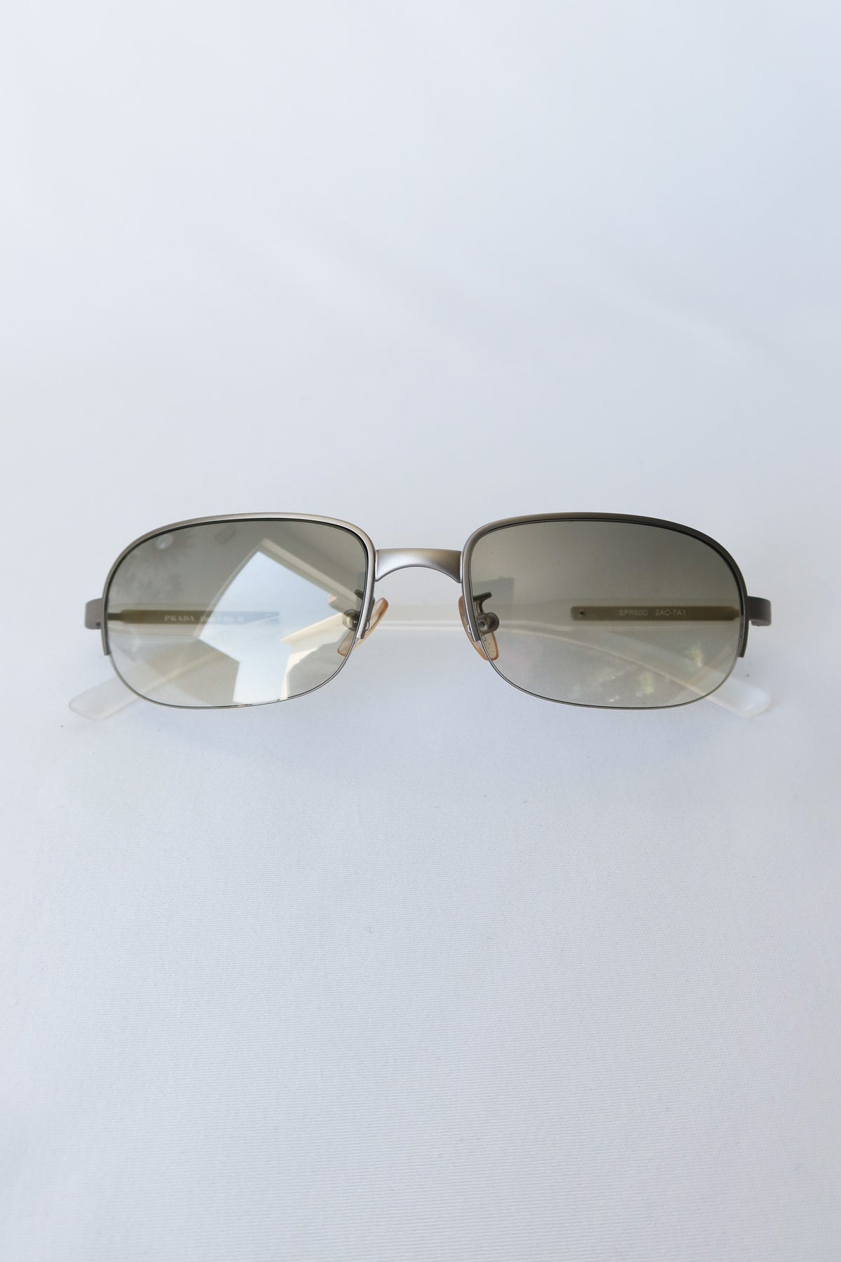 Prada Silver Rectangle Sunglasses · Case