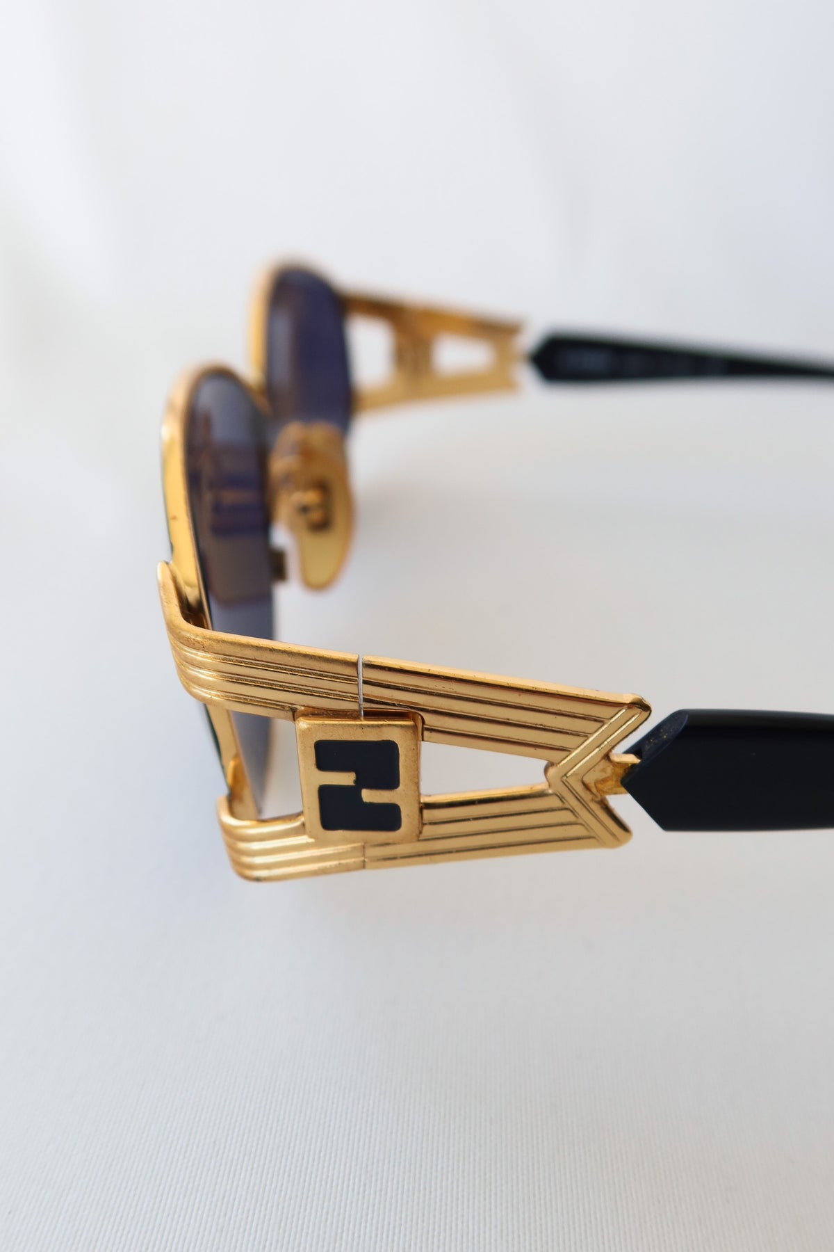 FENDI Gold Oval