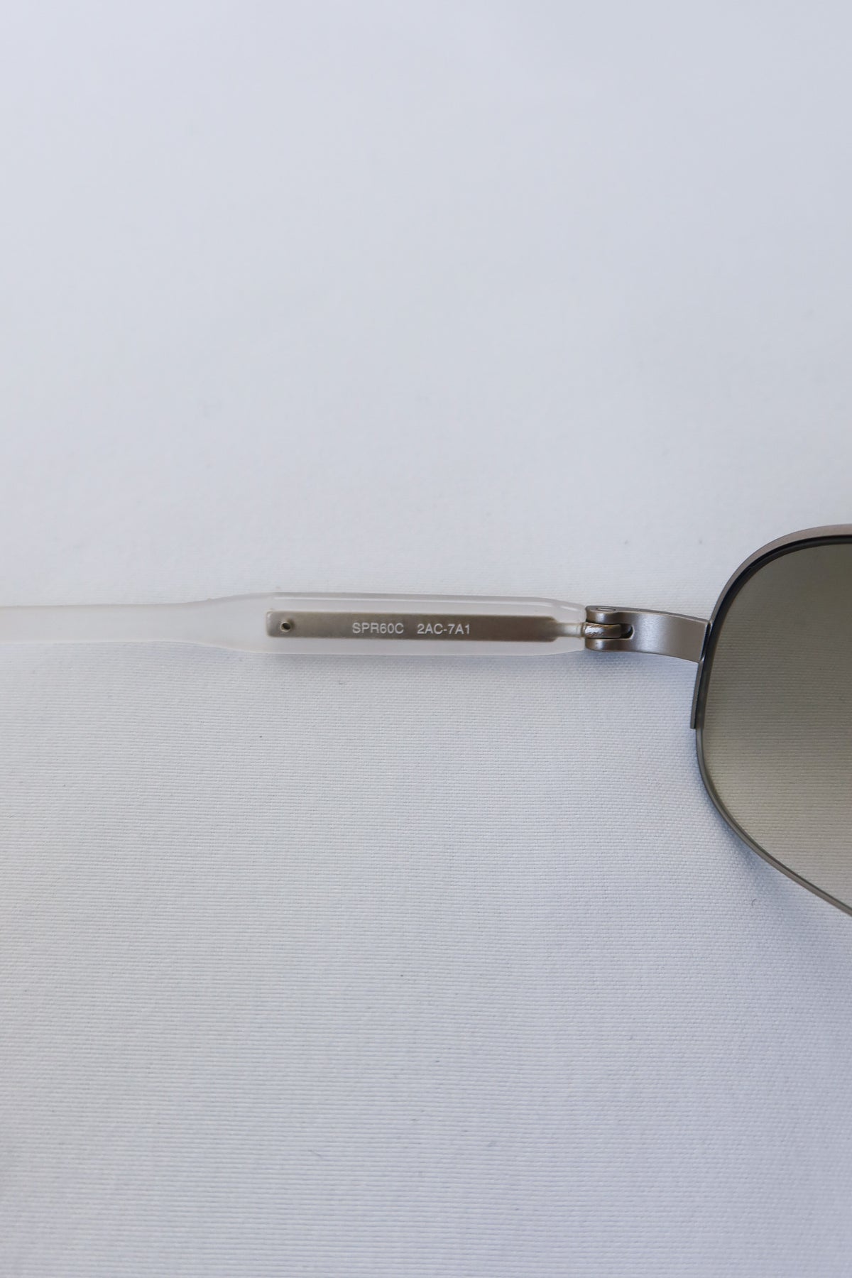 Prada Silver Rectangle Sunglasses · Case