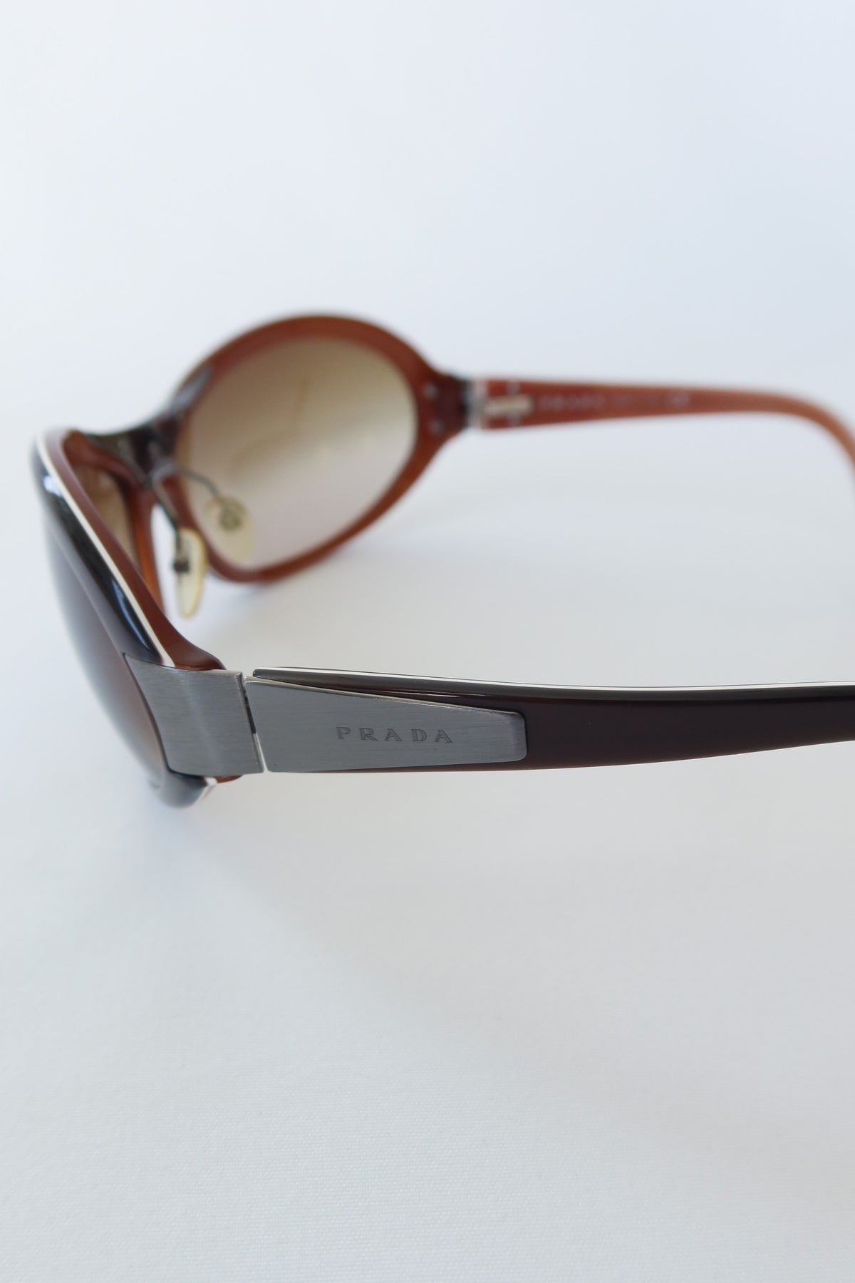 Prada Brown Shield Sunglasses · Case