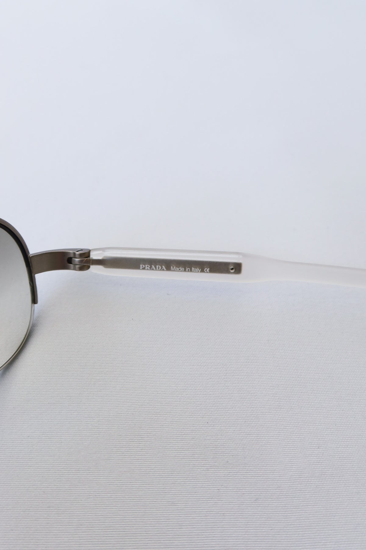 Prada Silver Rectangle Sunglasses · Case