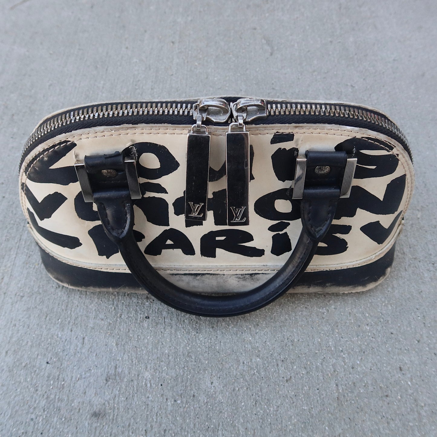 Louis Vuitton Alma MM white and black graffiti printed