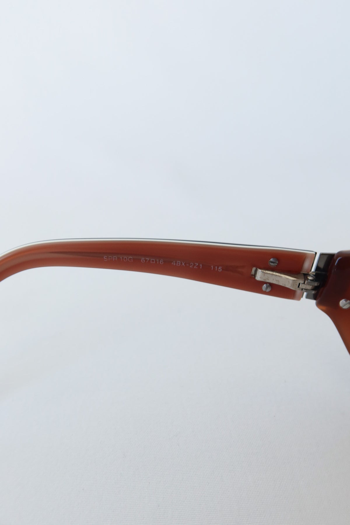 Prada Brown Shield Sunglasses · Case