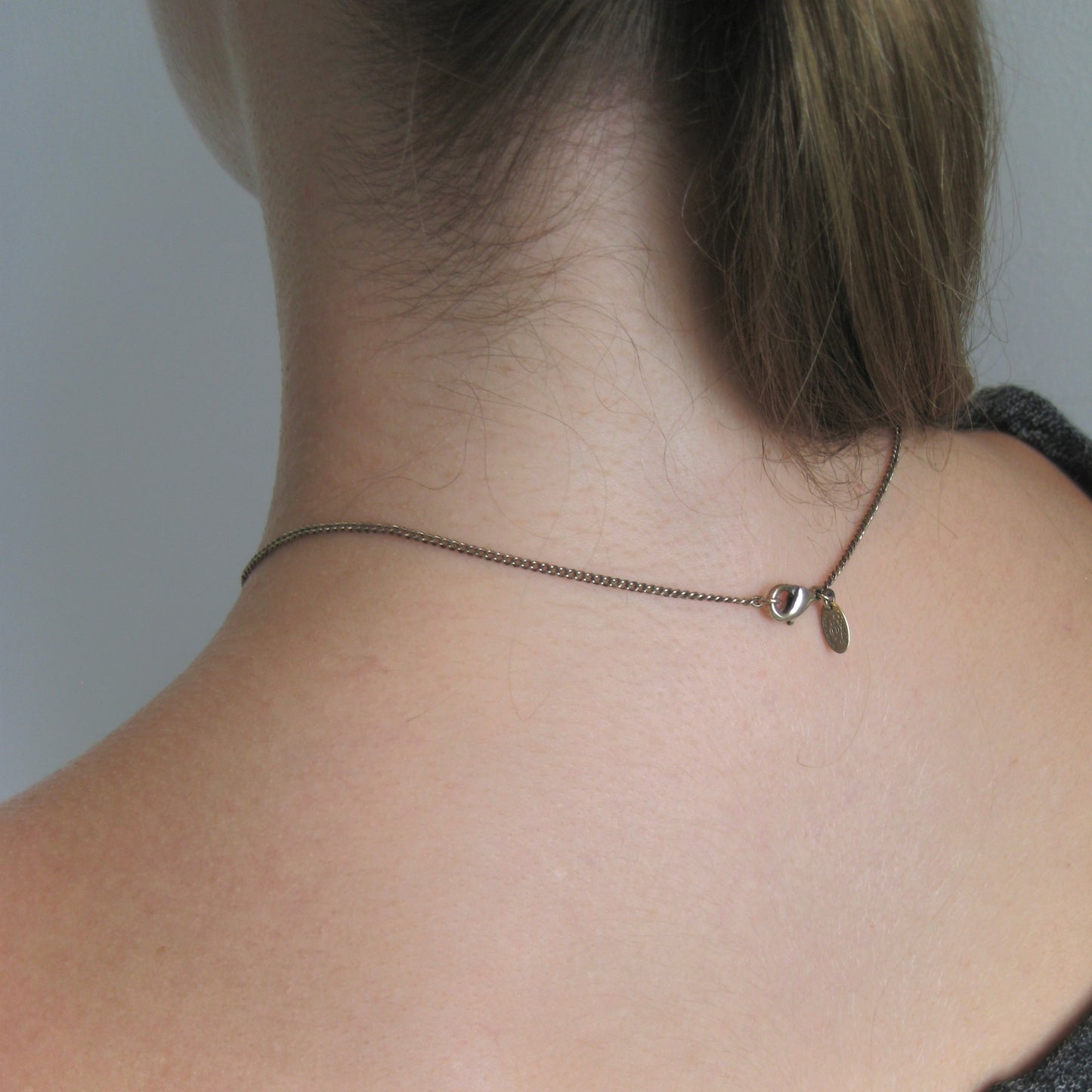 Chanel Enamel CC Camellia necklace in ivory and gold-tone metal