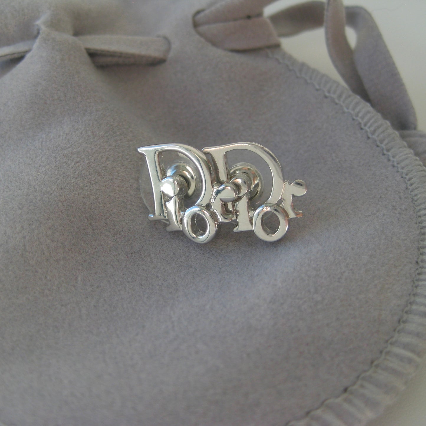 Dior silver logo earrings