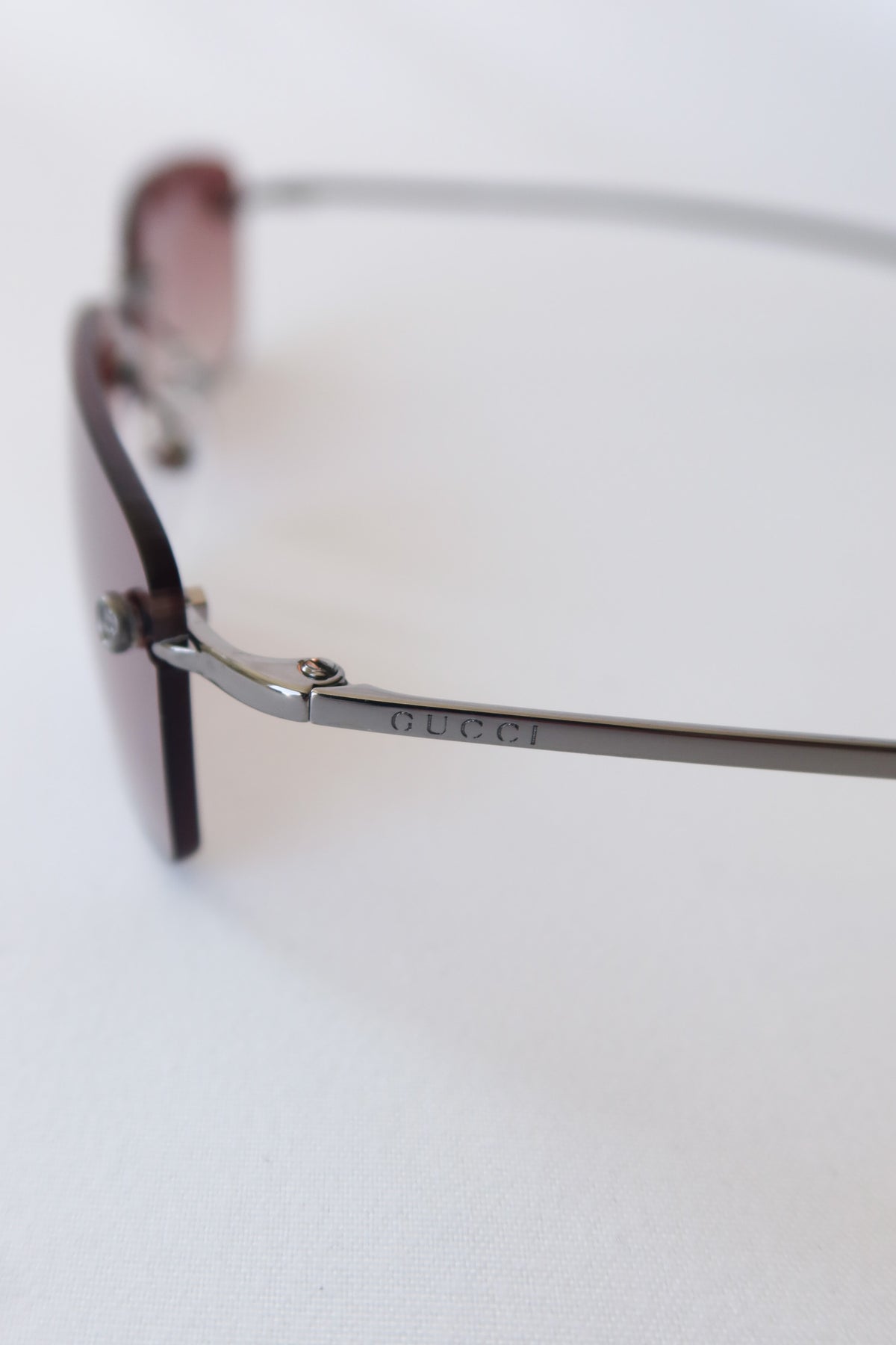 Gucci Rimless Rectangle Sunglasses · Case