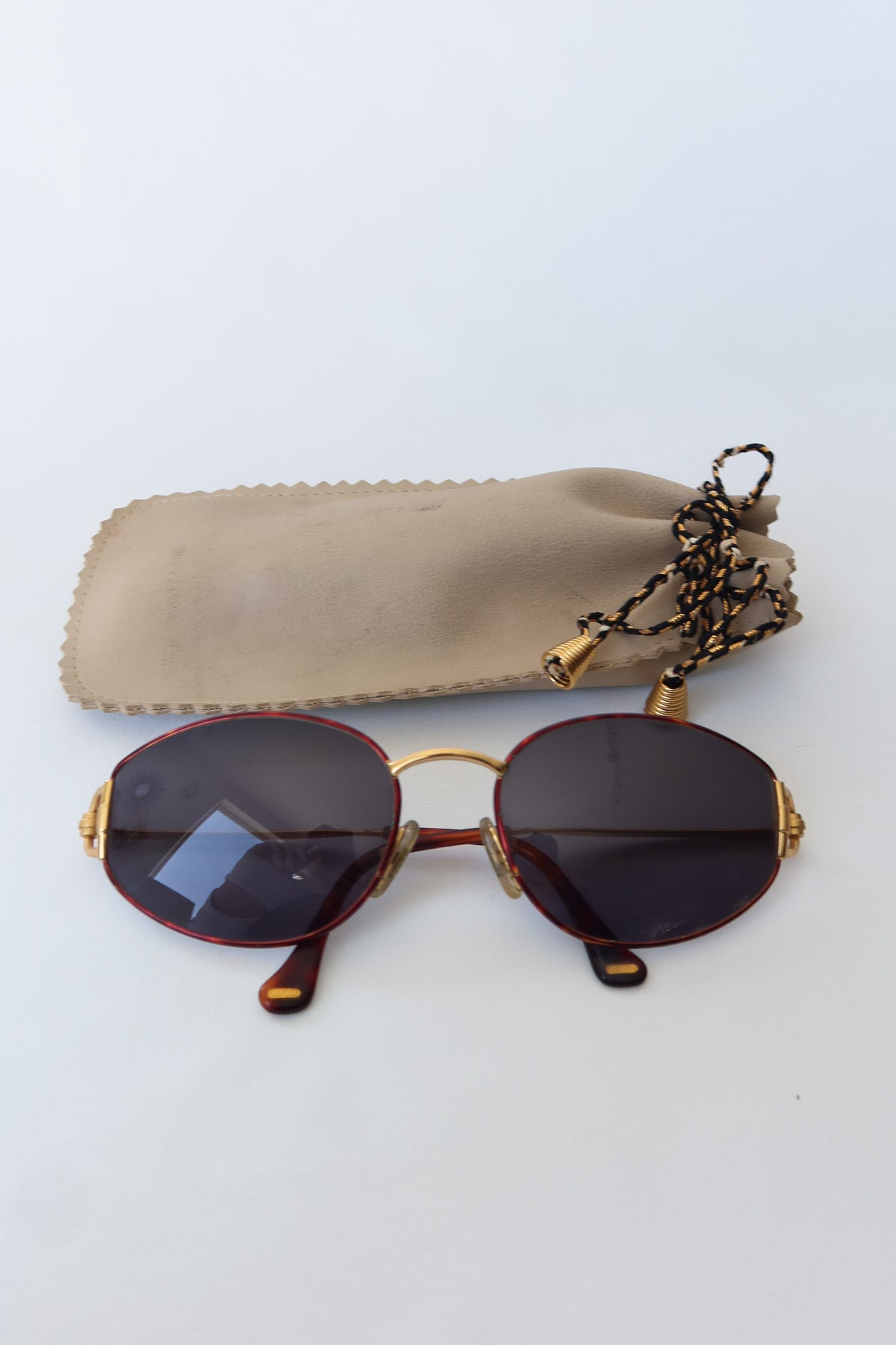 Gucci Gold Oval Knot Sunglasses