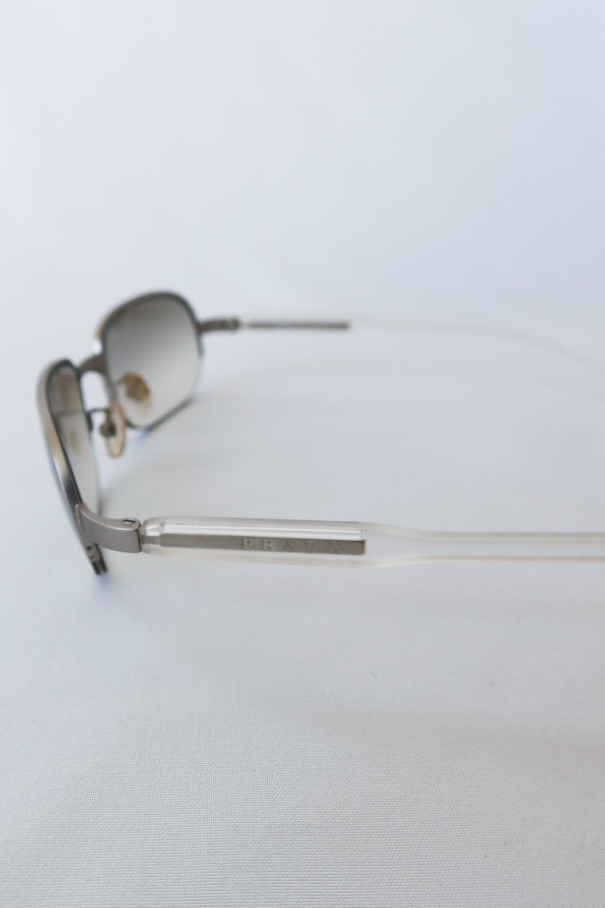Prada Silver Rectangle Sunglasses · Case