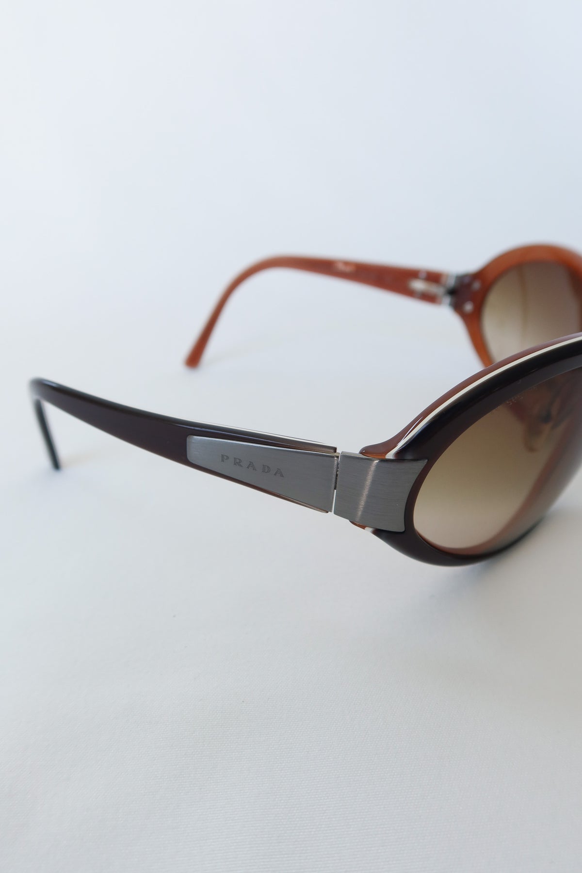 Prada Brown Shield Sunglasses · Case