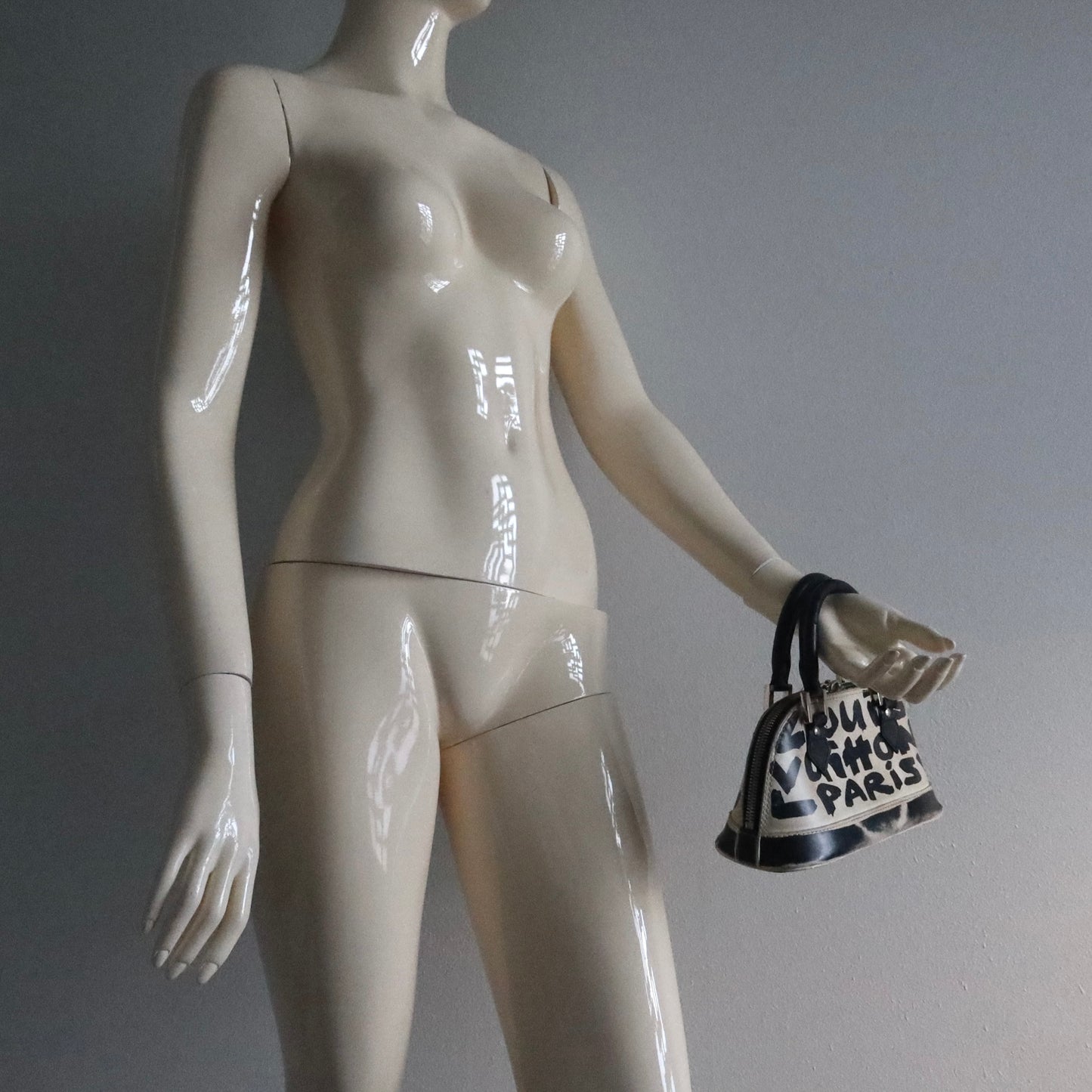 Louis Vuitton Alma MM white and black graffiti printed