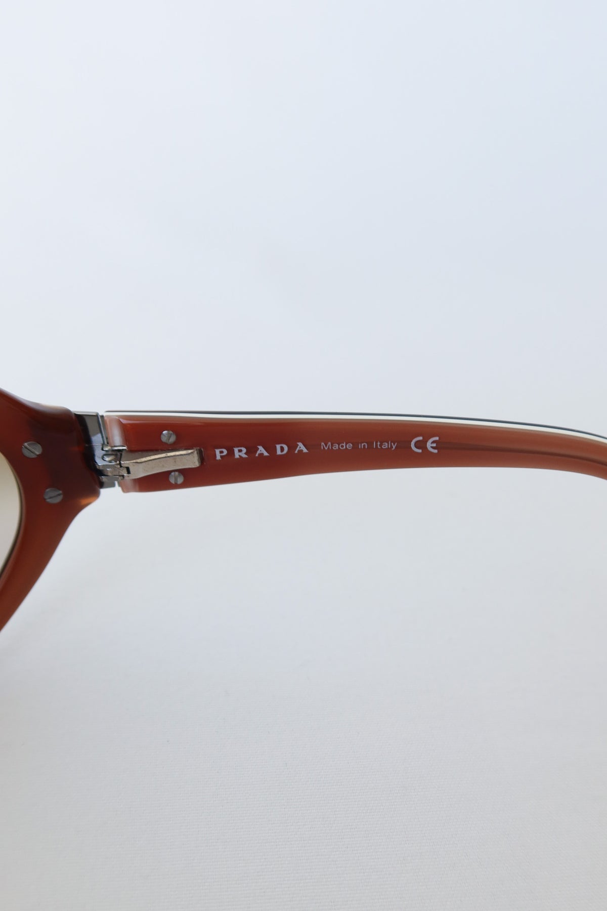 Prada Brown Shield Sunglasses · Case