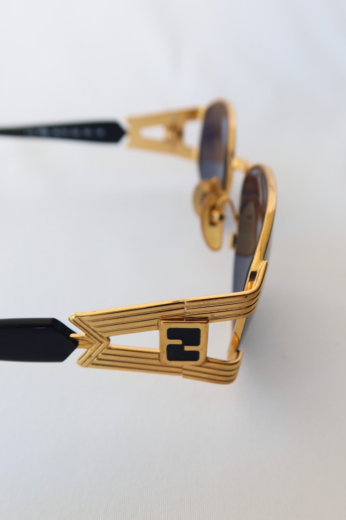 FENDI Gold Oval