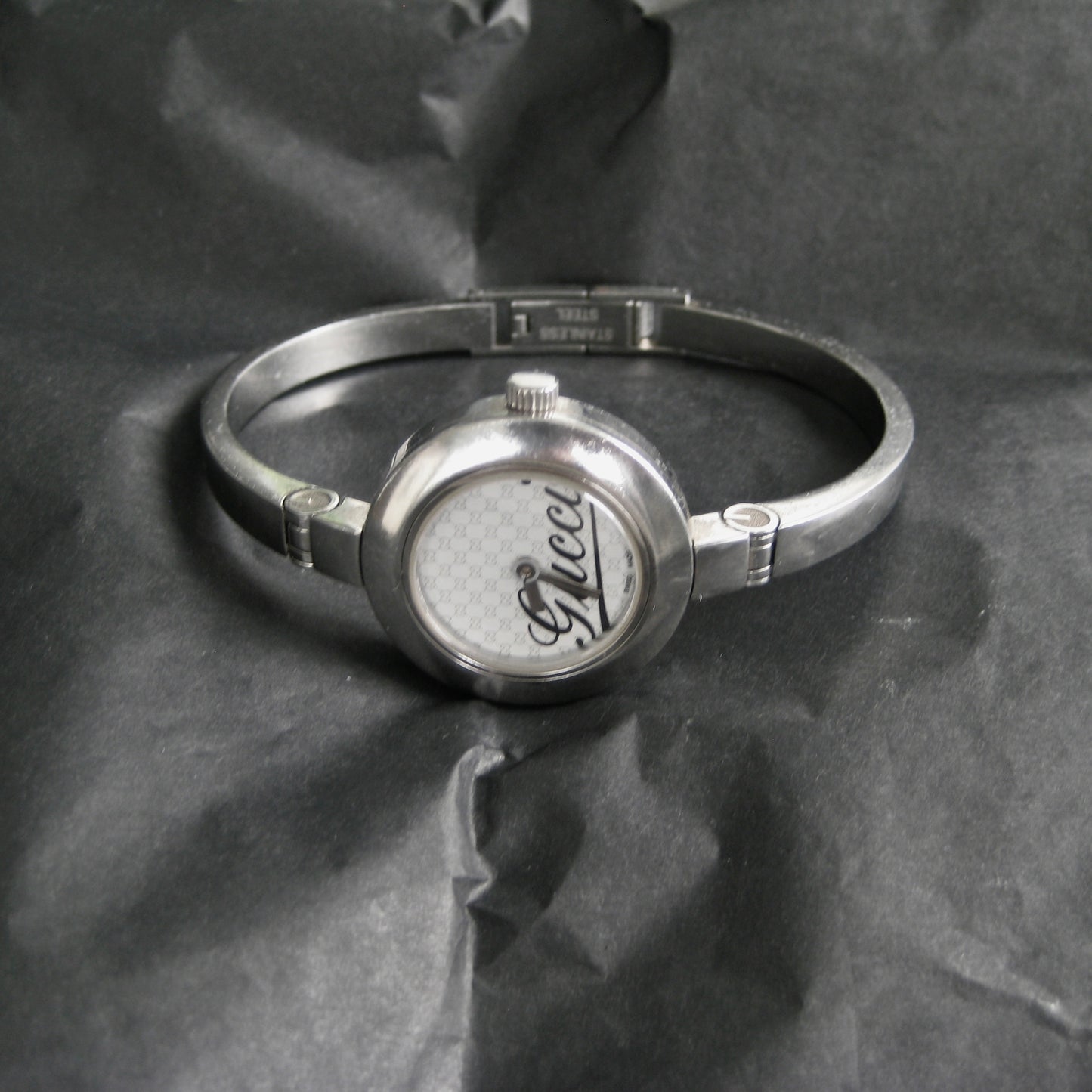 Gucci 105 stainless steel bangle watch