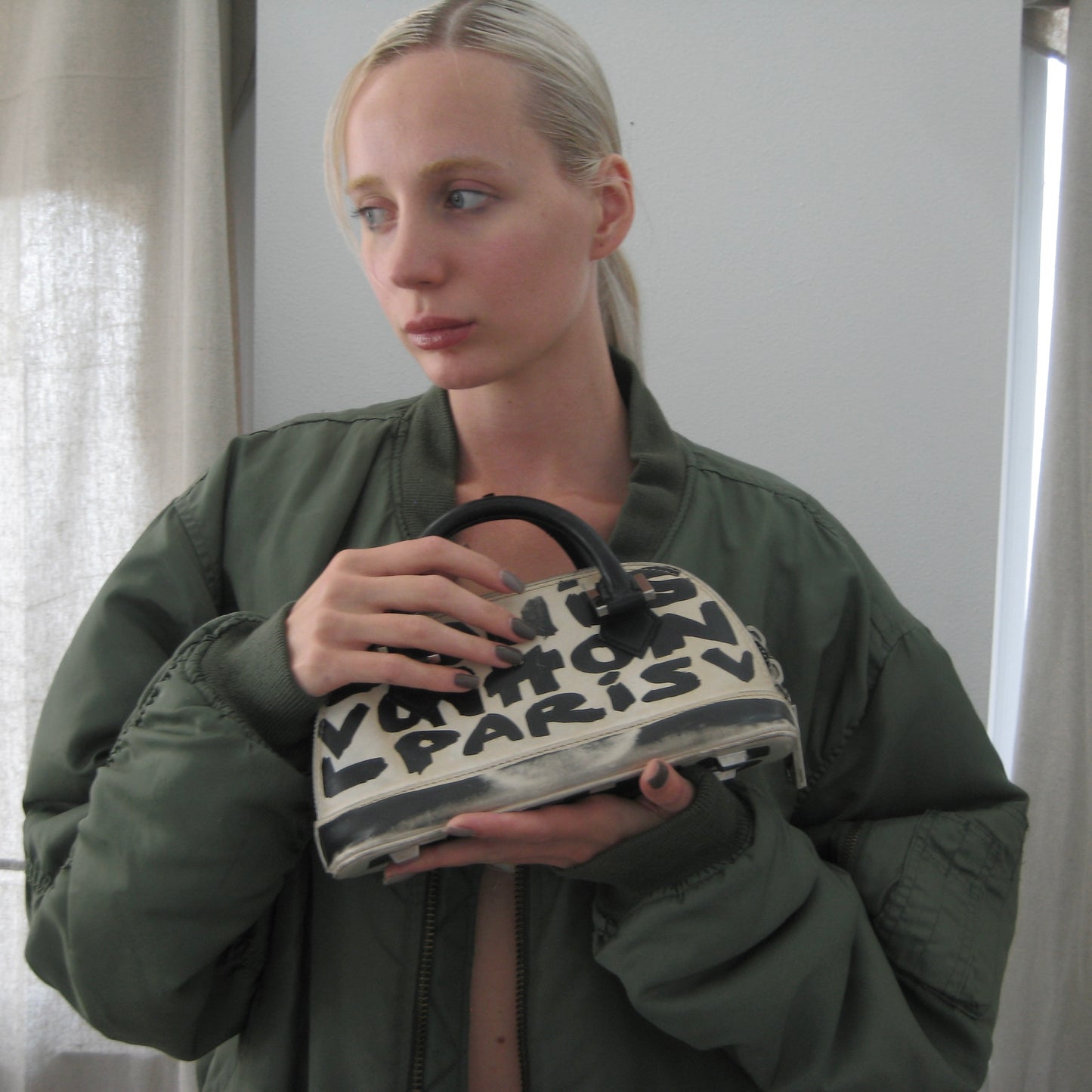Louis Vuitton Alma MM white and black graffiti printed